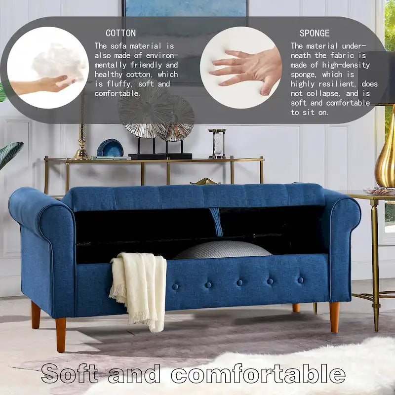 Banc de rangement capitonné en tissu bleu avec accoudoirs roulés et pieds en bois