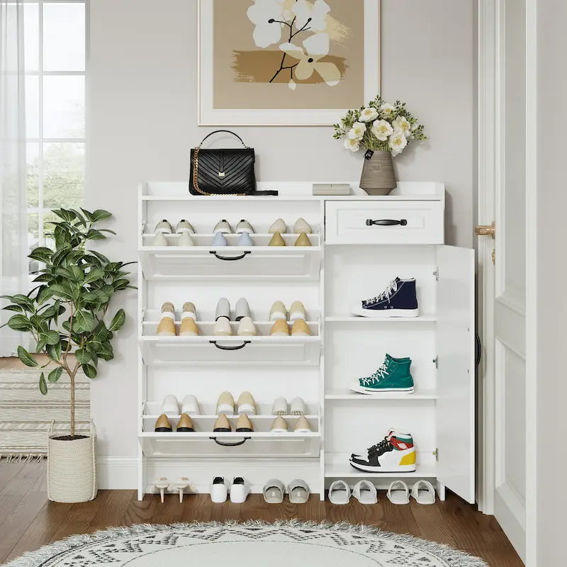 Meuble à chaussures blanc autoportant avec tiroirs basculants et rangement latéral.